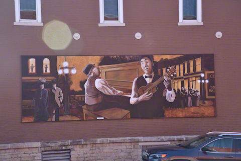 The mural on the side of the Sign Along Cafe