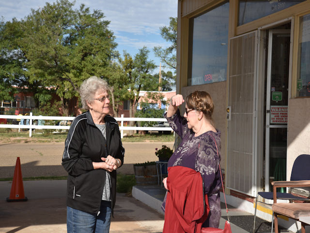 Sylvia chatting with the owner