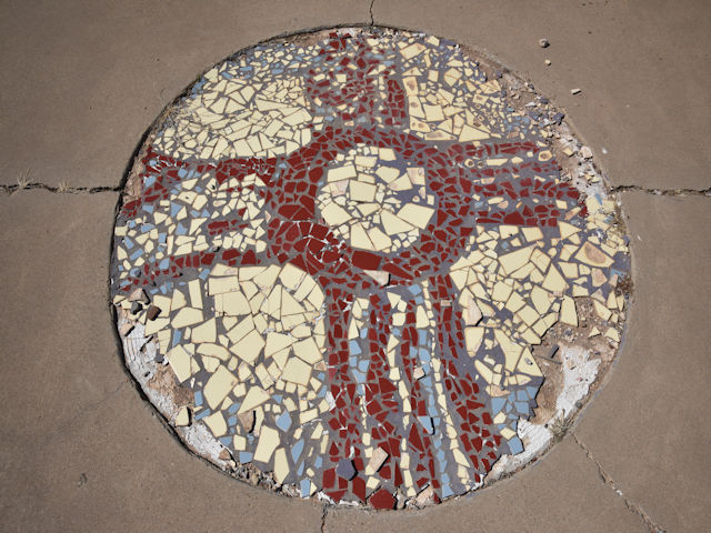 Mosaic in sidewalk